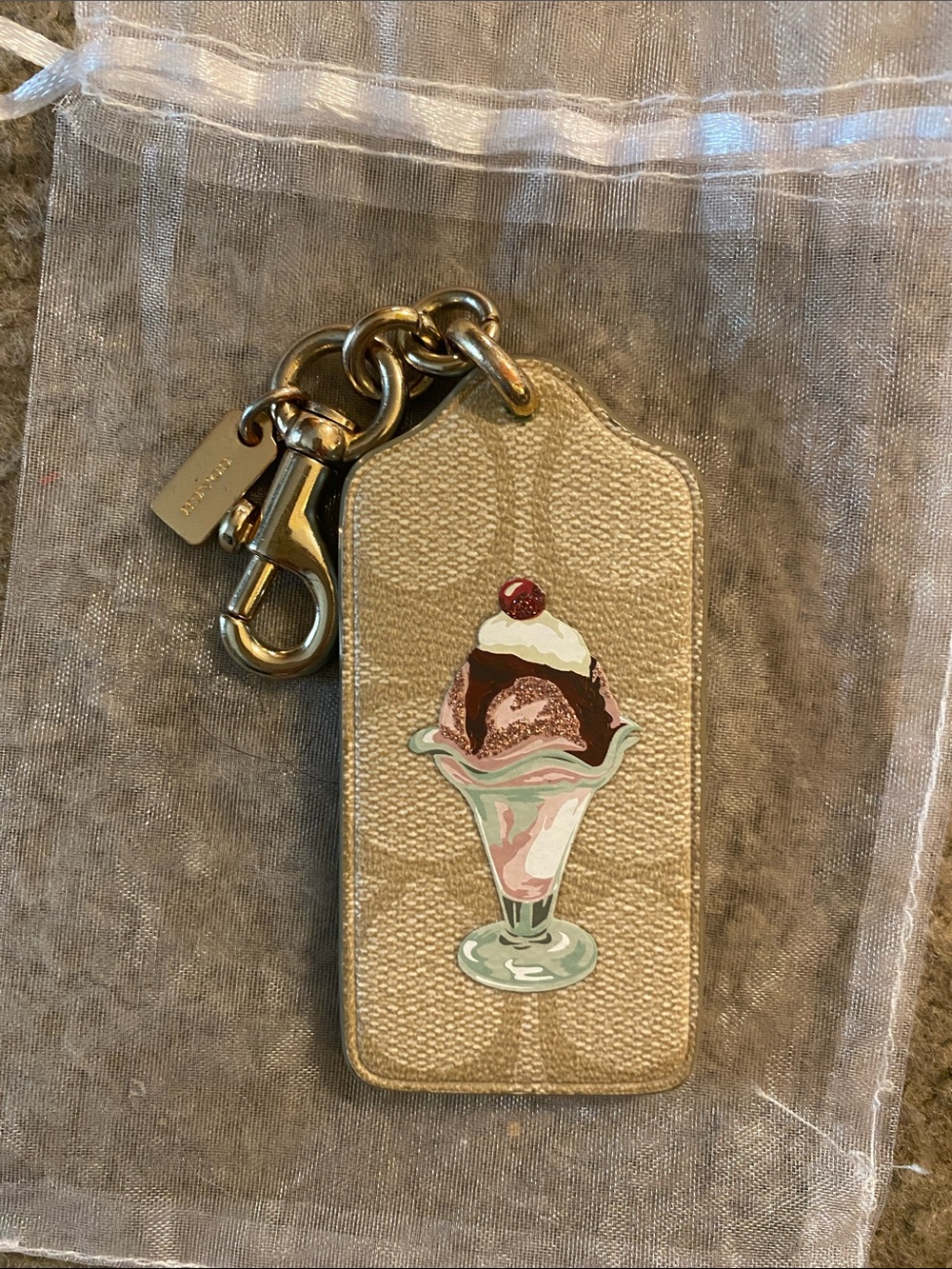 Coach Gold Signature C’s Key Tag with Ice Cream Sundae Motif